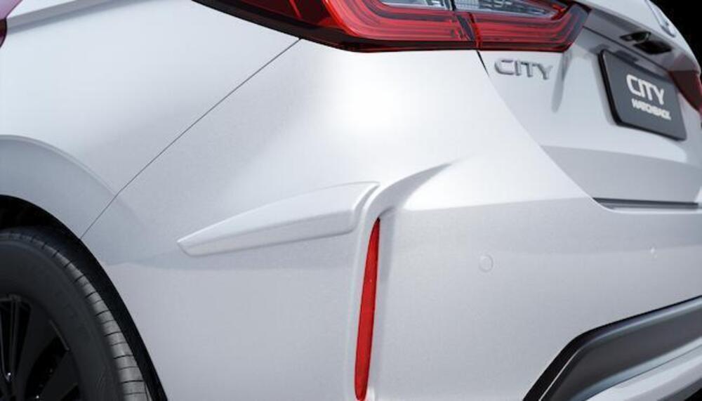 galeria PROTETOR LATERAL DE PARA-CHOQUE TRASEIRO Branco topázio perolizado